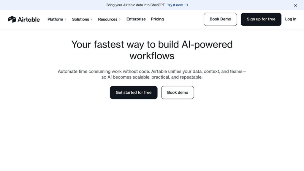 Airtable webpage promoting AI-powered workflows with options to "Get started for free" and "Book demo." Includes navigation menu.